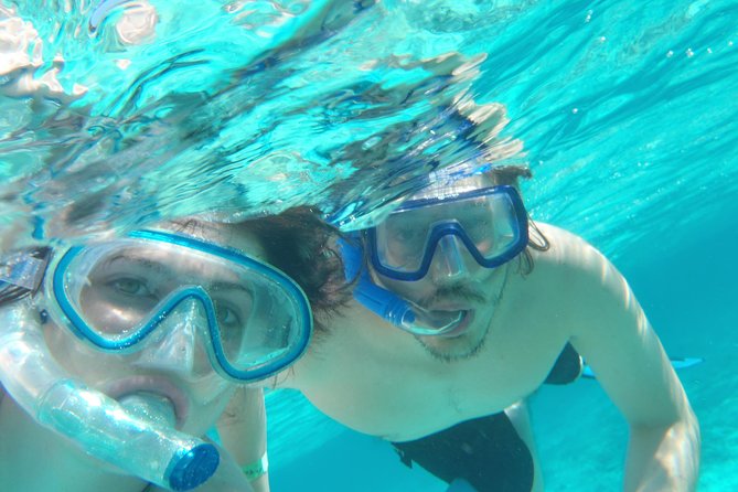 Punta Cana Snorkeling Party Cruise - Music, rum, fruit, and the natural pool