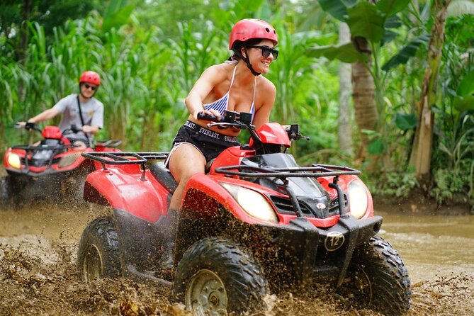 Quad Bike Ride and Snorkeling at Blue Lagoon Beach All-inclusive - Boarding the jukung boat at Padangbai