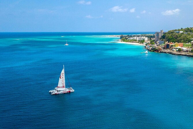 Reggae Catamaran and Snorkeling Open Bar Cruise Montego Bay - Margaritaville and extra spending