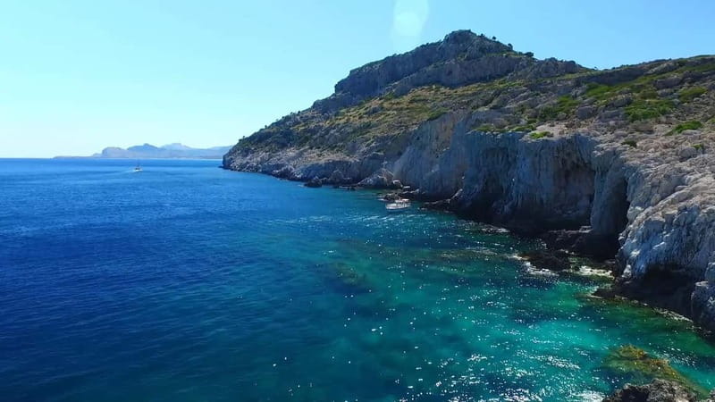 Rhodes: Anthony Quinn Bay & Sea Caves Snorkeling Cruise - Traganou’s rocky shore and sea caves