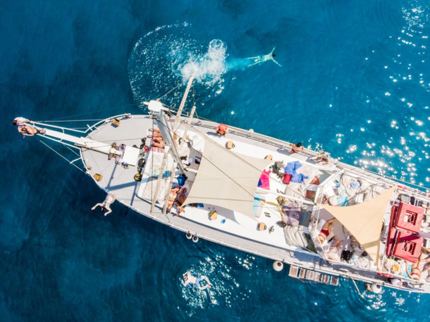 Rhodes: Boat Tour with Snorkeling, Gourmet Buffet & Open Bar - Meeting point, timing, and cancellation