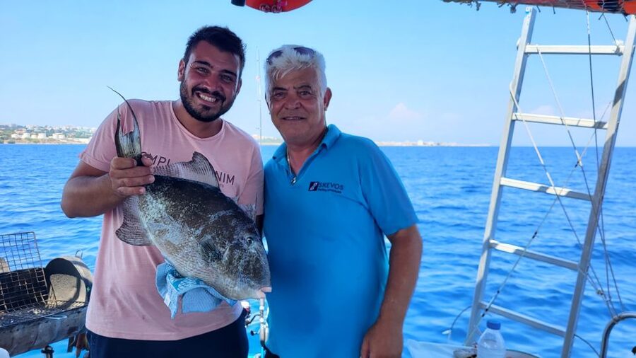 Rhodes: Fishing Trip, Snorkelling, BBQ, & Professional Guide - Ground fishing for about two hours