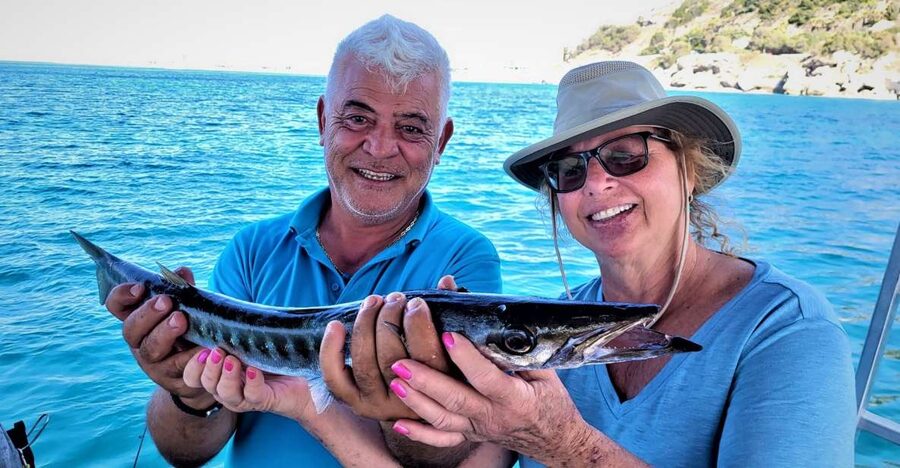 Rhodes: Fishing Trip, Snorkelling, BBQ, & Professional Guide - From Rhodes Town to the first fishing grounds