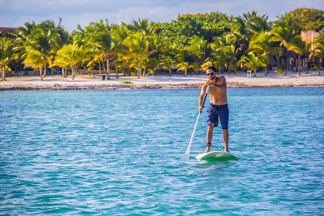 Riviera Maya Luxury Snorkeling Cruise with Lunch and Drinks - Paddleboards, water mats, and the second stop