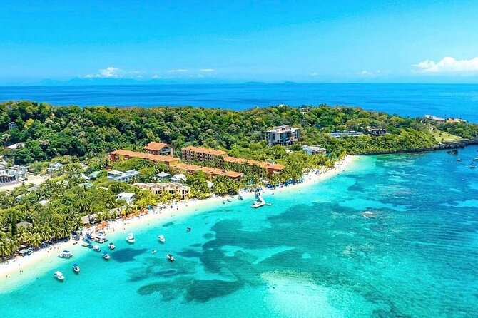 Roatán Private Snorkeling, Wildlife Park, and West Bay Beach - The five-minute boat ride to Blue Rock