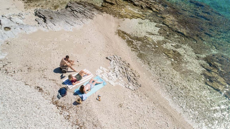 Rovinj: Luxury Island Hopping with Swimming & Snorkeling - Figarola brings shade and a slower pause