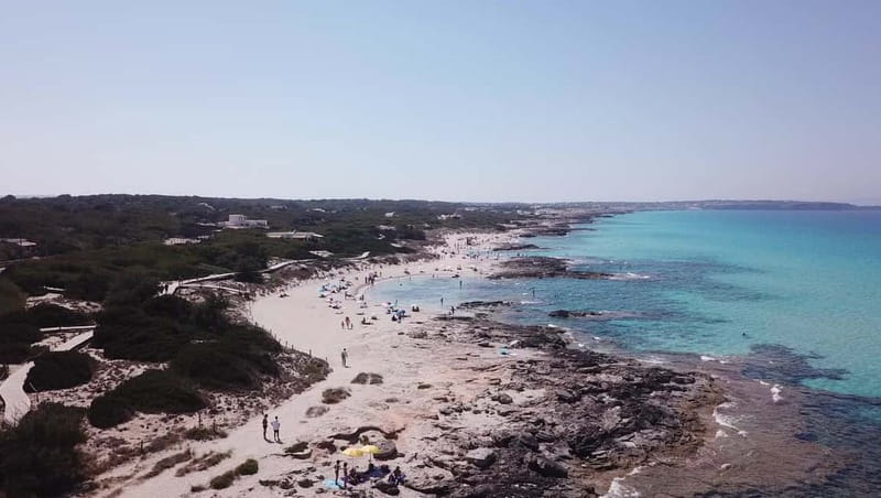 San Antonio: Es Vedrà & Formentera Boat Tour with Snorkeling - Paella, snacks, and drinks on the boat