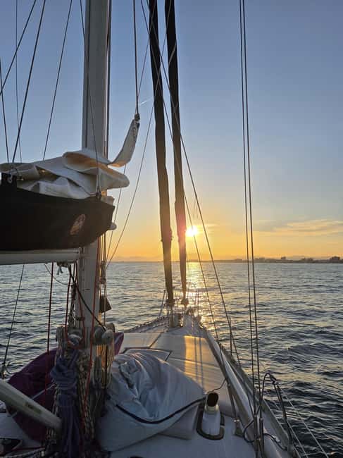 Santa Pola: Sail to Tabarca, snorkel, and enjoy sunset with a tasting - Swimming, paddleboarding, and time on deck