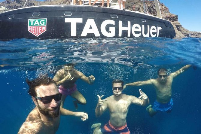 Santorini: Adventurous Catamaran Experience with Snorkeling - Red Beach and the southern caldera