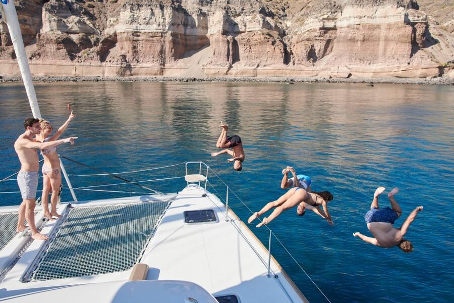 Santorini Gold Catamaran Cruise with Snorkel, BBQ & Open Bar - Red Beach and the first chance to snorkel