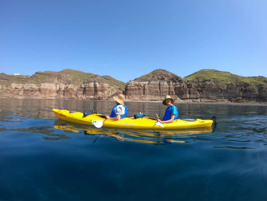 Santorini: Sea Caves Kayak Trip with Snorkeling and Picnic - Snorkeling in clear water