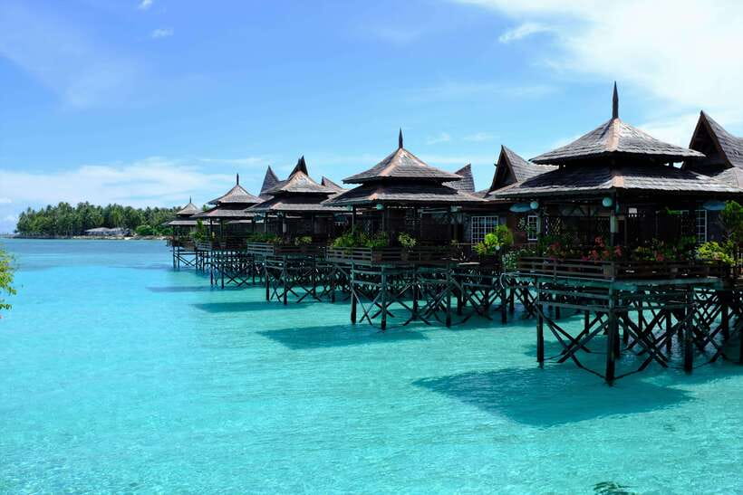 Semporna: Mabul and Kapalai Trip in Snorkel or Dive & Lunch - Mabul Water Bungalows and the water village