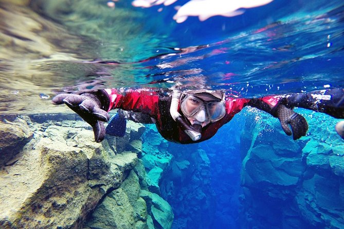 Silfra Drysuit Snorkeling Tour with Free Photos - From Reykjavik - How much fitness and swimming skill do you need?