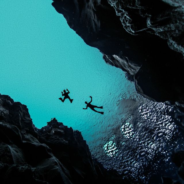 Silfra: Leidarendi Lava Caving & Snorkeling Tour with Photos - Getting ready for cold freshwater