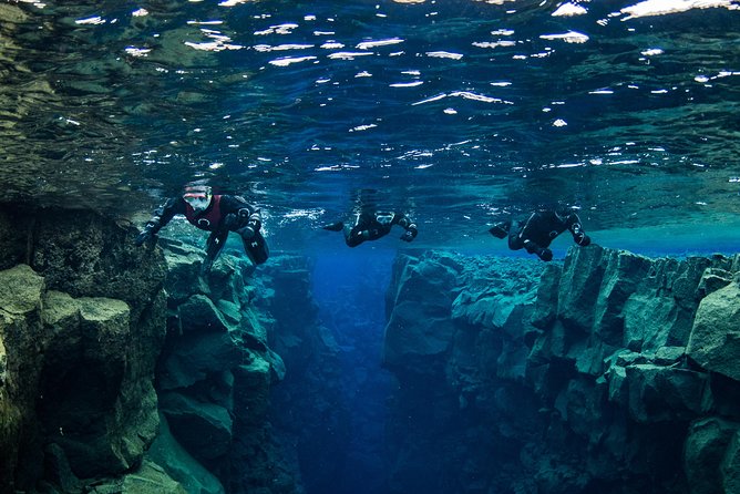 Silfra: Snorkeling Between Tectonic Plates Pick Up from Reykjavik - Walking to the water and entering Silfra