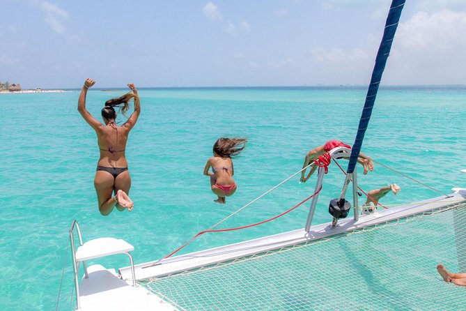 Snorkeling Adventure at Isla Mujeres Includes Lunch and Open Bar - Lunch, drinks, and the beach club stop