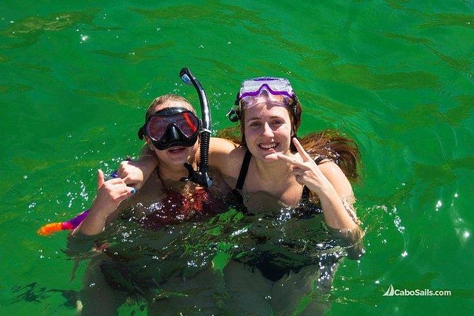 Snorkeling in Cabo San Lucas on 35' Sea Amore Trimaran - Paddle boards and the large water mat