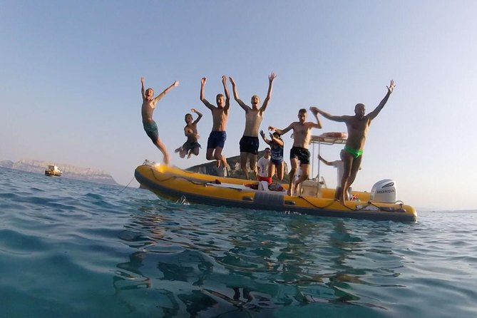 Snorkeling marine protected area Tavolara - White sand and two-sided water at Punta Spalmatore
