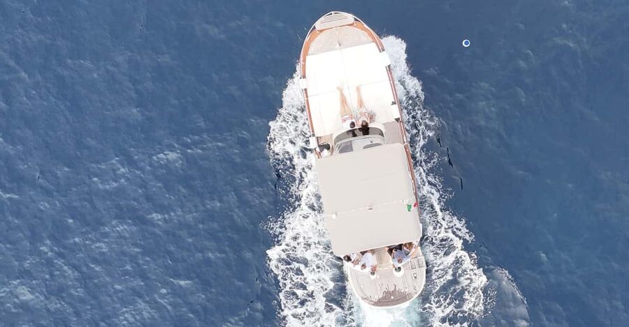 Sorrento: Capri and Blue Grotto Yacht Tour with Snorkeling - The Blue Grotto and the cost of entering