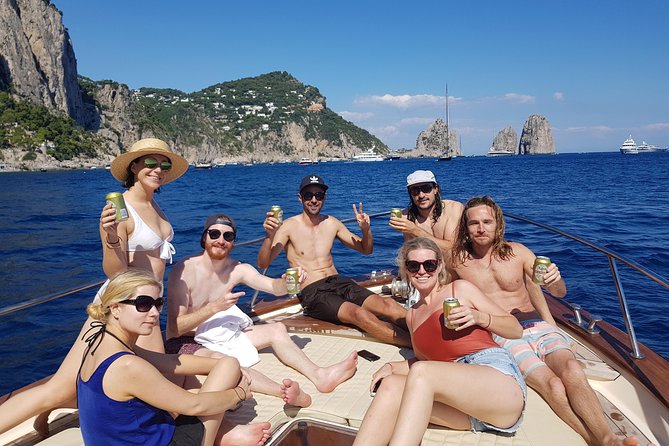 Sorrento: Capri Select Boat Trip with Swim, Drinks & Pick Up - The Faraglioni and Capri’s famous rock formations