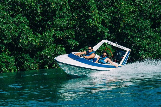 Speed Boat & Snorkel Tour with transportation ( only Cancun zone area) - Following the guide through mangroves and open water