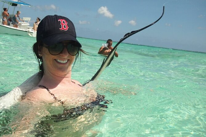 Stingray City Experience Plus Two Snorkeling Stops on Grand Cayman - Captain Marvin’s crew and boat service