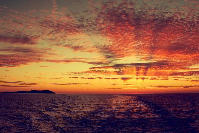 Sunset Beach Hopping Cruise, Cala Comte and Cala Bassa, SUP and snorkelling - Leaving San Antonio for Ibiza’s west coast