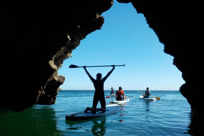 SUP Tour in Algarve Ingrina Caves w/ Snorkeling & Photos Included - Entering the grottoes and smaller caves