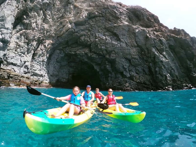 Tenerife: Kayak & Snorkel with Local Fauna, Photos Included - Paddling past Los Cristianos and the black cliffs