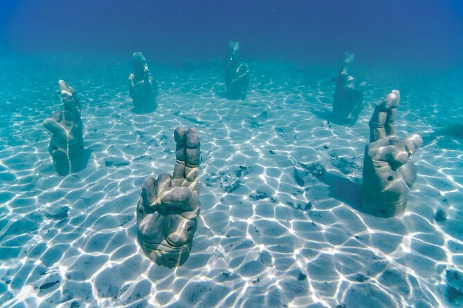 Top Isla Mujeres Catamaran Tour with Snorkel Open Bar and Buffet lunch - The sunset sail back to Cancun