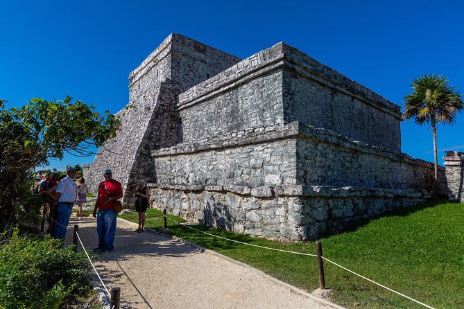 Viator Exclusive: Tulum Ruins, Reef Snorkeling, Cenote and Caves - A cenote with caves, clear water, and a darker mood