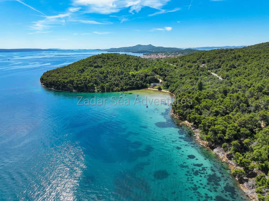 Zadar: Island Hopping Tour Swim and Snorkel with Aperol - Stop one: an hour in a clear swimming cove