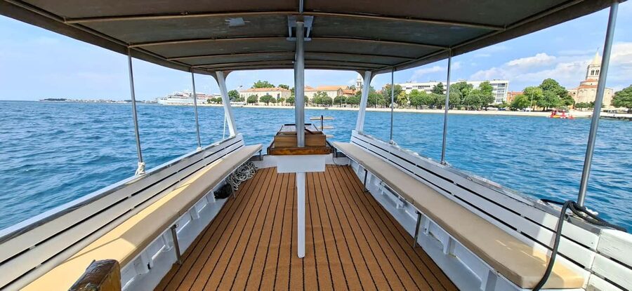 Zadar: Island Hopping Tour Swim and Snorkel with Aperol - Stop two: a tiny island for walking and quiet views