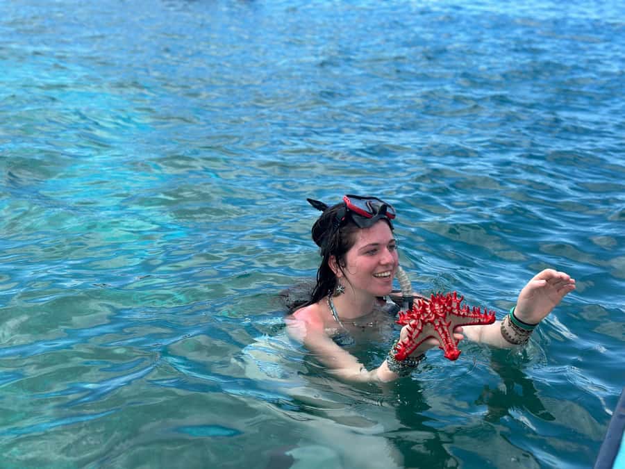 Zanzibar: Mnemba Island Dolphin and Snorkeling Tour - Shallow water, sandbanks, and the fruit stop